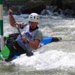 Put on a Half-Cut Whitewater Kayak Helmet