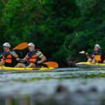 How do you attach a leash to a kayak paddle?